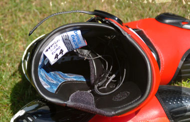 You can just see the inner boot with its own set of laces. The top fastener is clearly shown, too. 