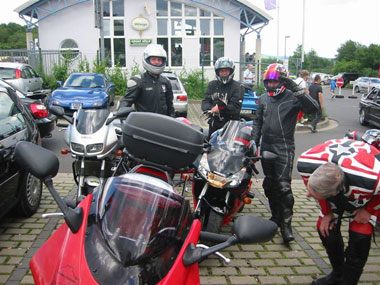 In the carpark at the Nurburgring. Riding round may be optional, but daft grins and excited chatter afterwards are utterly compulsory...