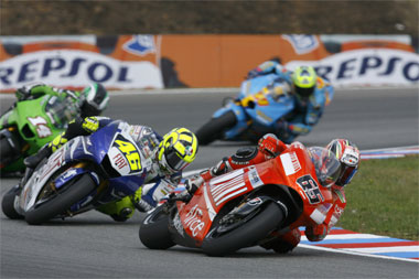 It wasn't this close for long. Capirossi and Rossi tussle ahead of de Puniet while Vermeulen closes in...