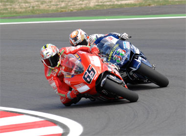 Capirossi and Melandri giving it their best shot at making the race interesting...