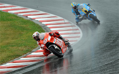 Marco Melandri and Loris Capirossi, old adversaries at the wrong end of the pack. Melandri will not be staying with Ducati next year...