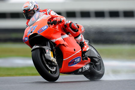 Casey Stoner knows his way around Phillip Island...but that much power in the rain? Look at his eyes... (Pic: Ducati)