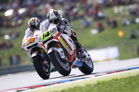 Randy de Puniet just doesn't know when to lie down and rest. He broke his leg four weeks ago, and here he is fighting with Marco Melandri... (Pic: LCR Honda)