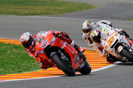 Stoner leads Melandri and de Puniet on the last lap (Ducati)