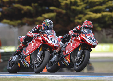 Haga shows little regard for Corser's feelings as he mugs him for fourth place at the end of race one.