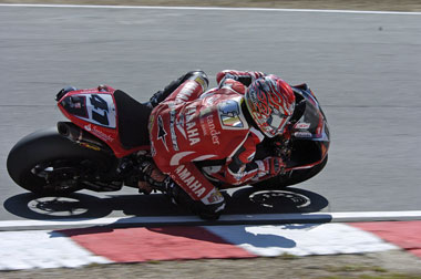 Nori Haga isn't one to just lie in the gravel after a crash - check out the back of his leathers...