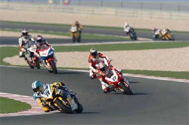 A well strung out field with the unusual sight of Kagayama leading Lanzi with Bayliss behind. Fabrizio heads Xaus behind them...
