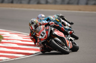 Corser just leads Tom Sykes and Max Biaggi through Druid's