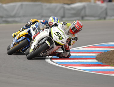 And the crowd went wild...as Jakub Smrz climbed all over the back of Sofuoglu's Ten Kate Honda...