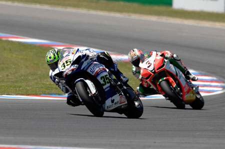 Cal Crutchlow fighting the Yamaha and losing. Biaggi and the tame Aprilia look on... (Pic - Claus Hermann)