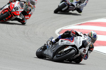 Corser holds off Camier and Crutchlow in Race Two. Second place at this stage, from fifteenth on the grid. The man can still boogie... (Pic: BMW)