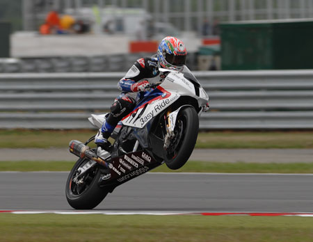 Troy Corser is the consummate professional...and pulls a pretty good wheelie too. Mind you, he'd also just had a good Superpole...